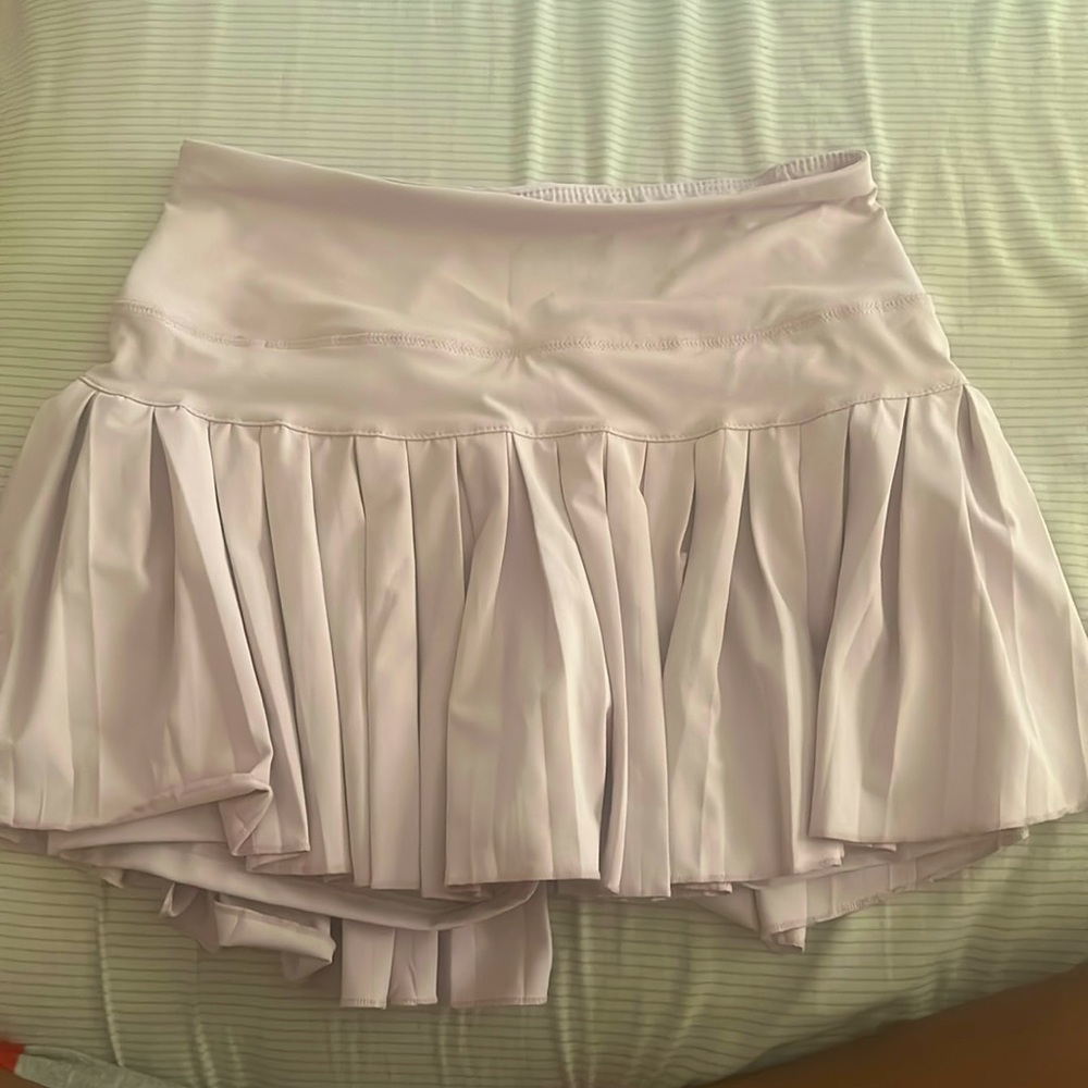 Size small Light Pink pleated Tennis Skirt w/ built in pockets